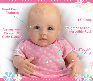 This lifelike So Truly Mine doll from The Ashton-Drake Galleries is crafted with RealTouch vinyl, has hand-painted features, arrives with a sleeper and cloth diaper, is weighted to feel incredibly real and is 15 inches long.