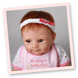 Ashton-Drake Galleries baby doll headband application tip: your doll is ready to be displayed